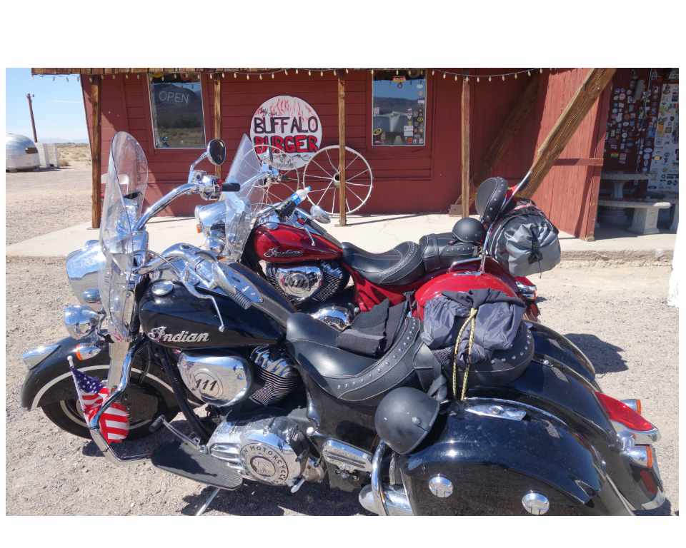 Two Indian motorcycles outside Bagdad